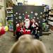 Ann Arbor residents Sharon and Ryan Clemons are photographed with their dogs Lola and Harley at Pet Supplies Plus on Saturday. Last year they wondered into the store to get a bath for their dog and ended up taking pictures with santa. Daniel Brenner I AnnArbor.com
